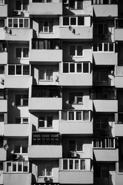 the windows of a building in black and white