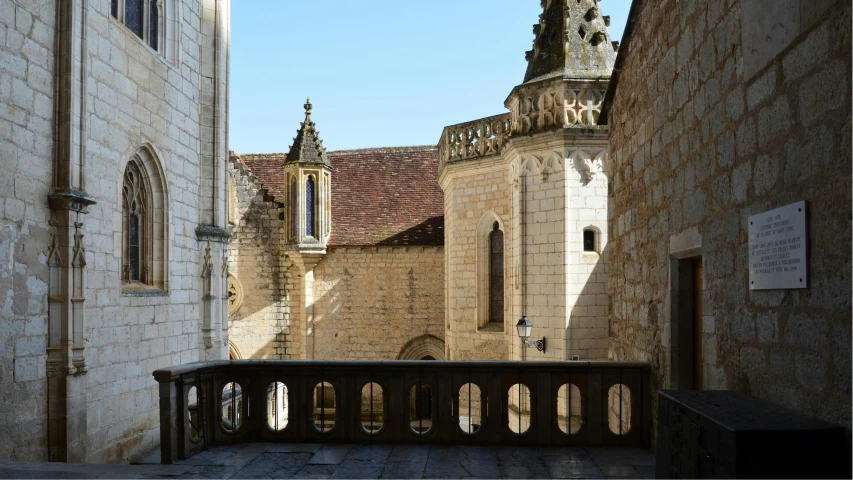 a stone building with an old clock tower