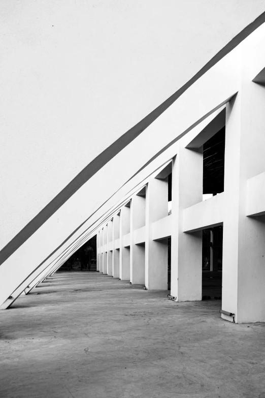 black and white pograph of a hallway in a building