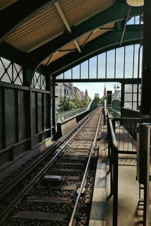 a train station with a train on the track