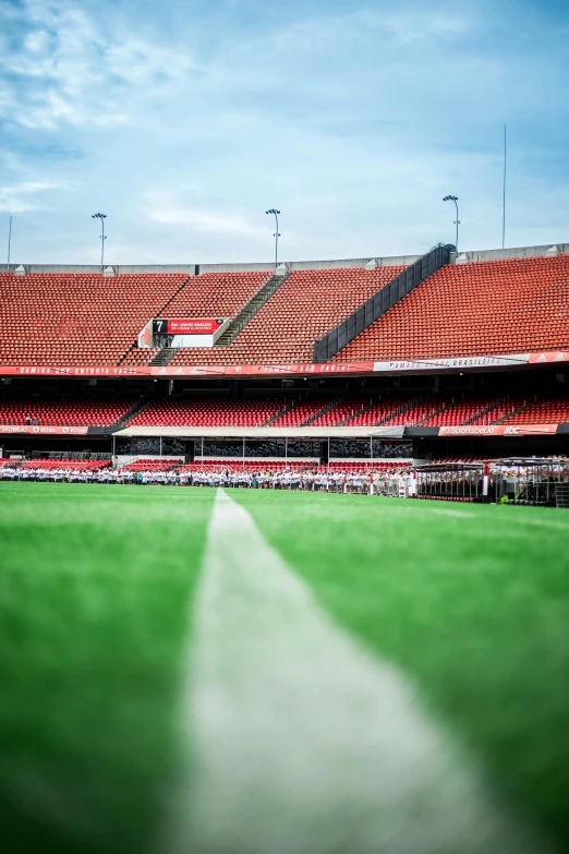 the empty stadium stands before an onlooker