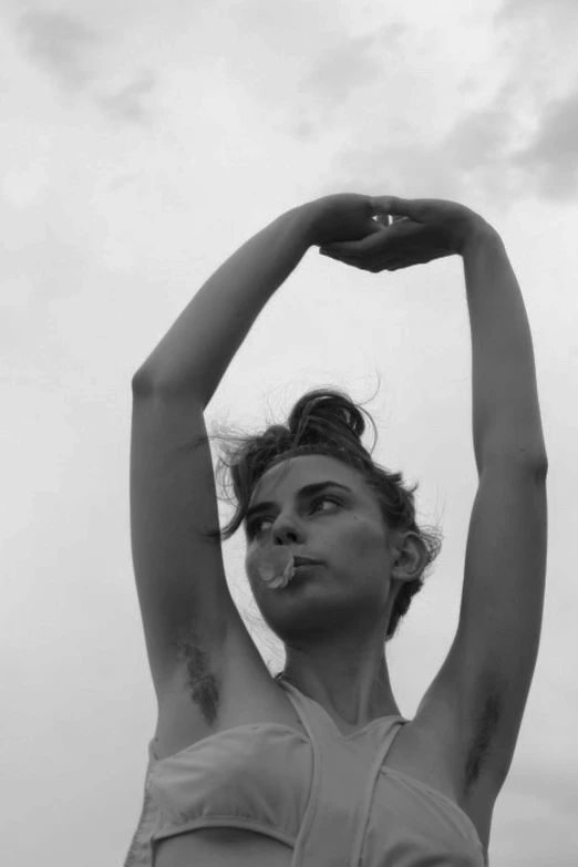 black and white pograph of a woman doing yoga