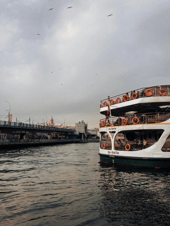 several paddle boats on a body of water