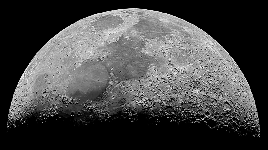 black and white pograph of a moon with very many circles