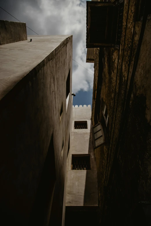 two buildings with windows, one on the left and the other on the right