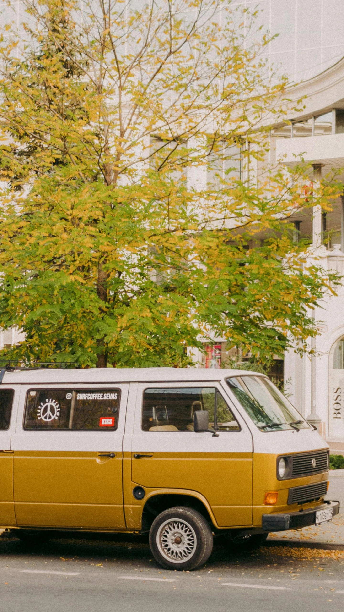 a van that is parked on the side of a street