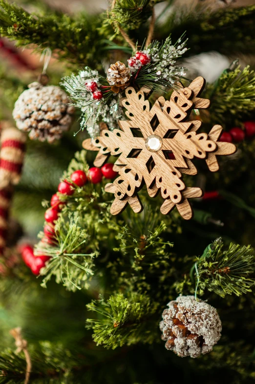 a christmas tree with some little snowflakes on it