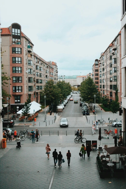 a view of a city square filled with people