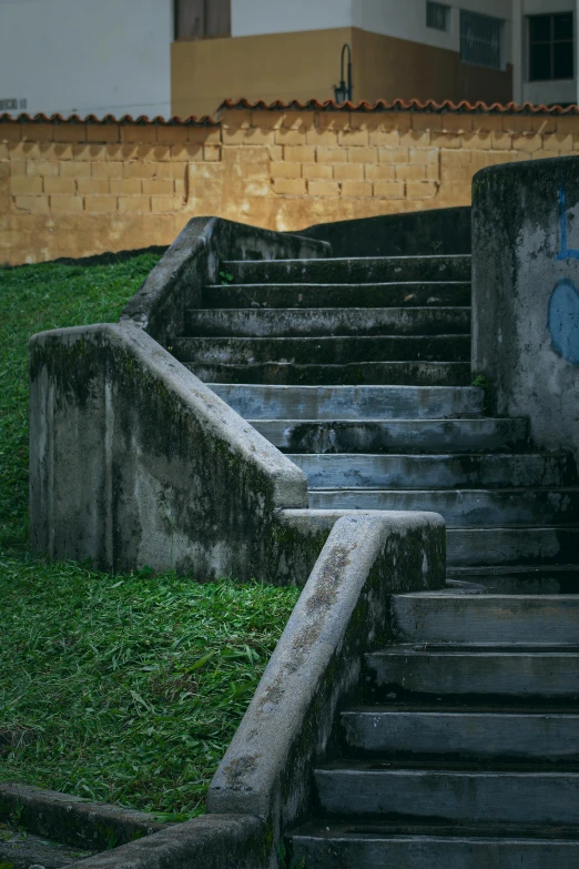 concrete steps in grass next to a building