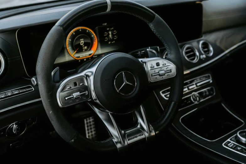 the dashboard of a car, with dashboard controls and gauges