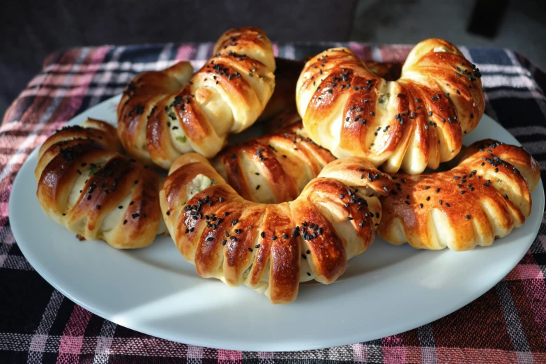 a plate that has some bread on it