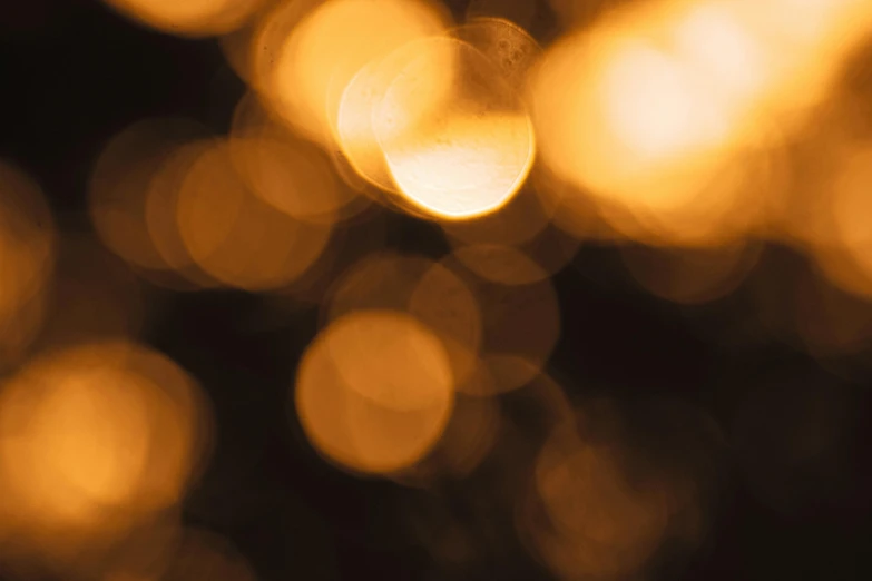 some golden lights in a blurry background