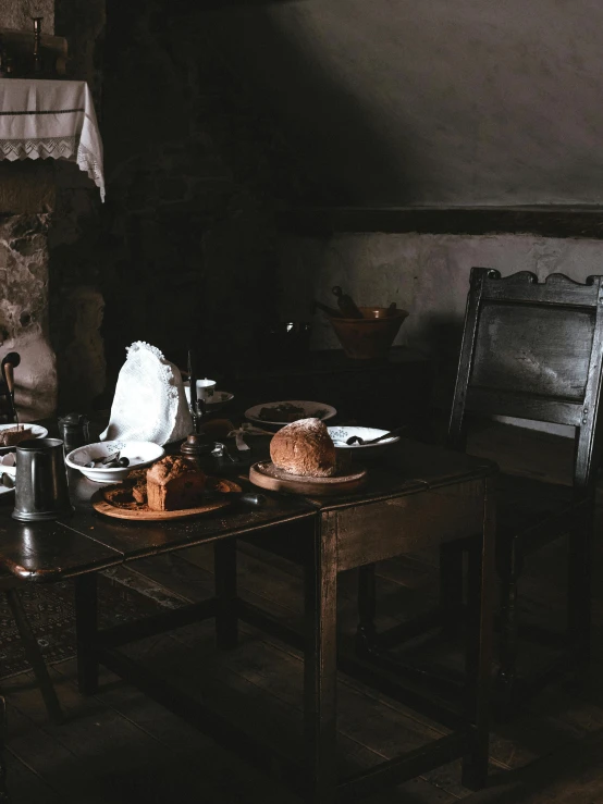 a kitchen scene with focus on the dining table