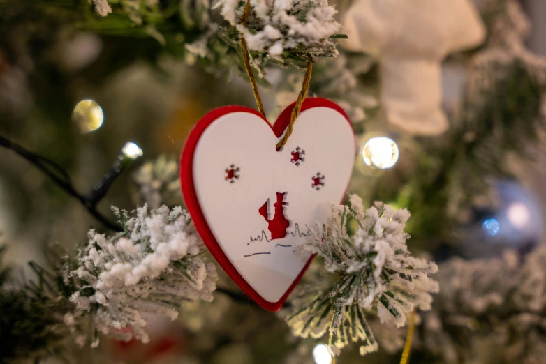 a decorated heart on a christmas tree