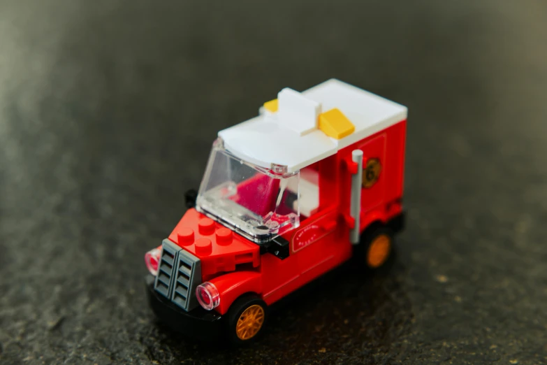 a small toy truck is on a table