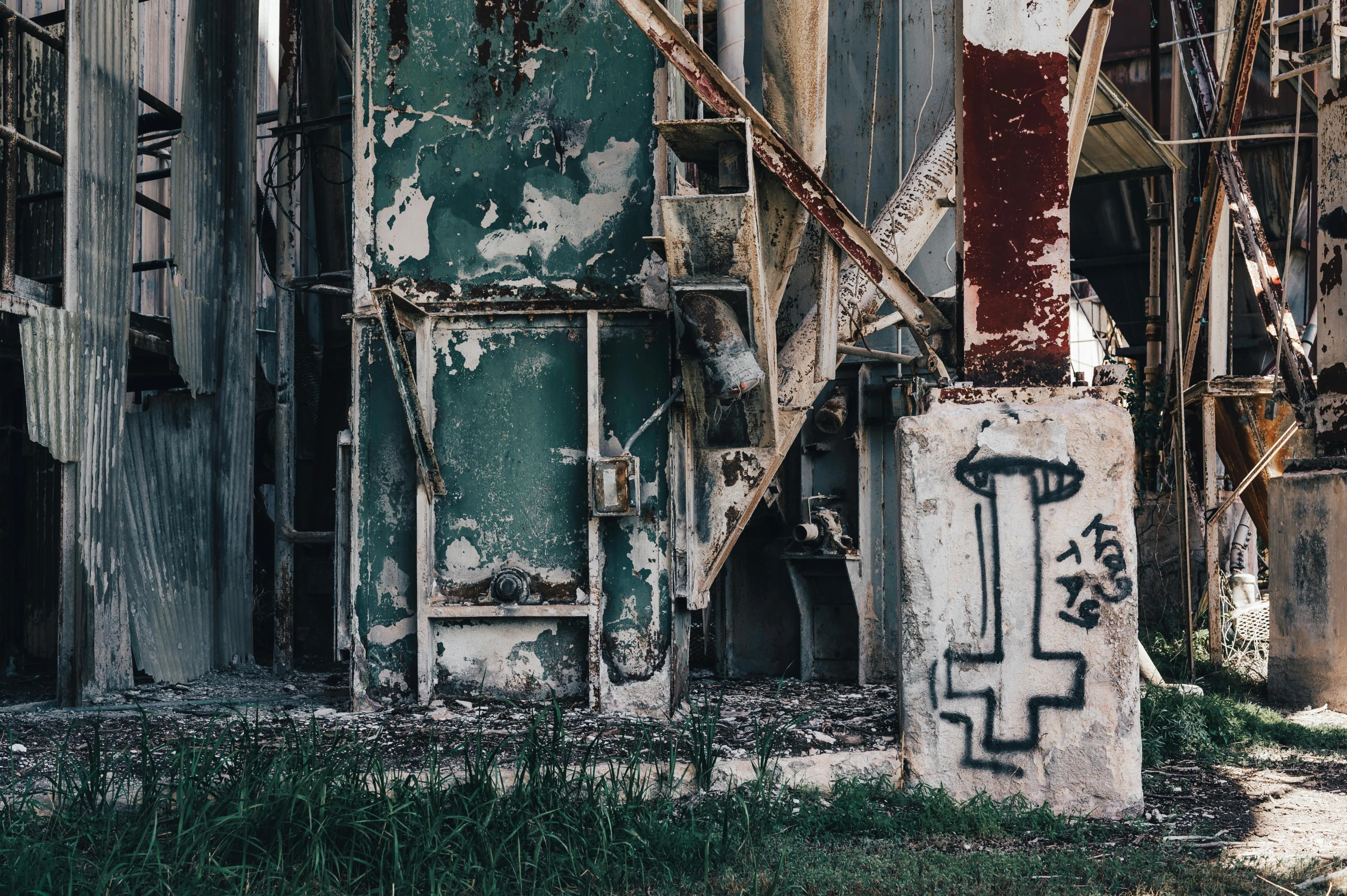 this is a dirty, rundown building with graffiti on it