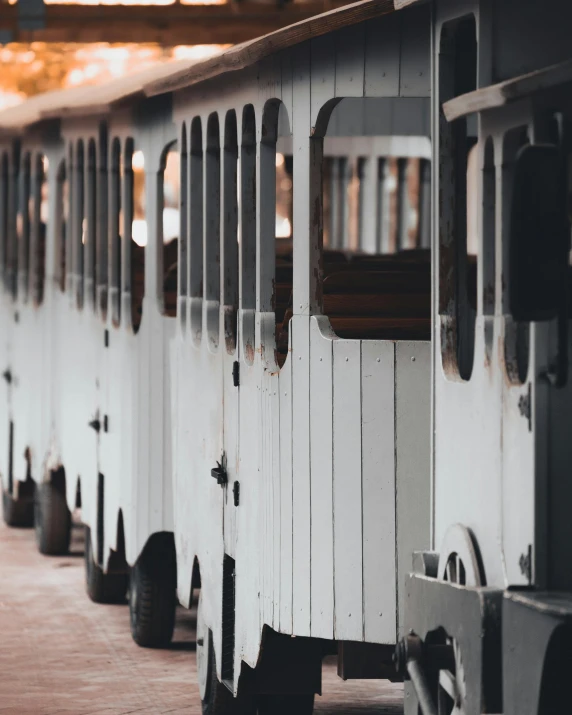 several train cabooses sit in a row