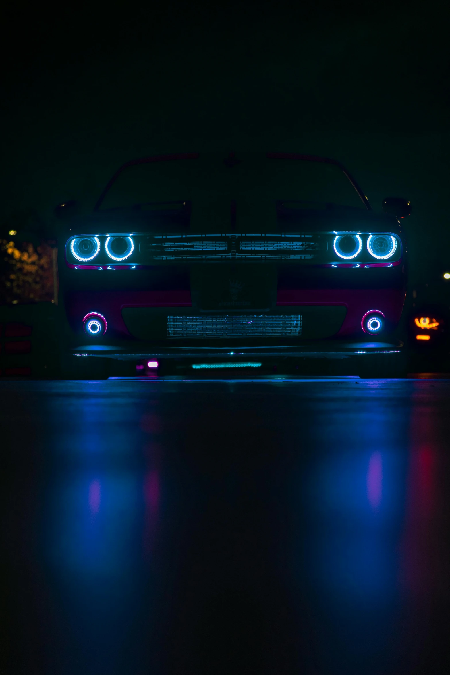 an image of a car with lights on at night