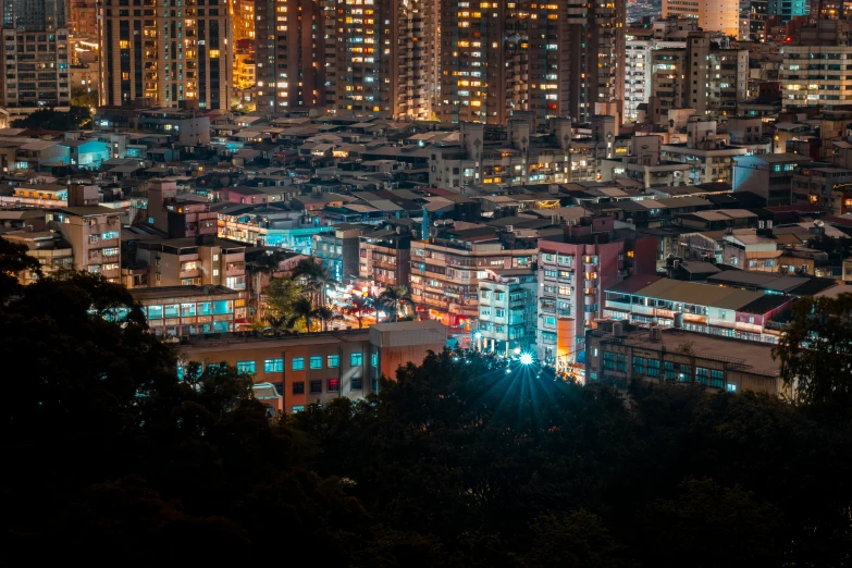 a city skyline at night lit up with light