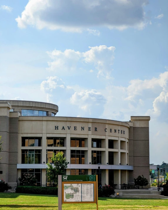 a sign is in front of a building