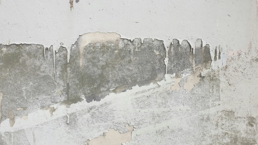 a piece of grey paint has been added to the wall