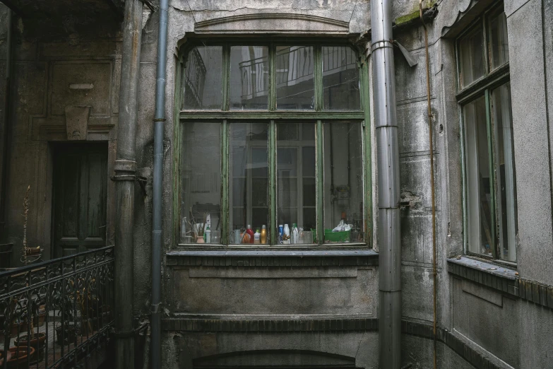 an old building with a window and lots of windows