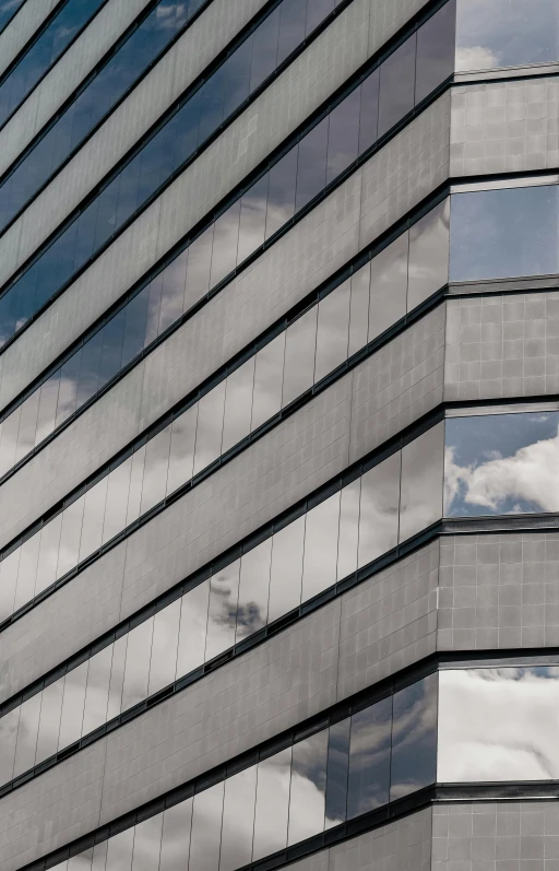 an office building with an airplane flying through the windows