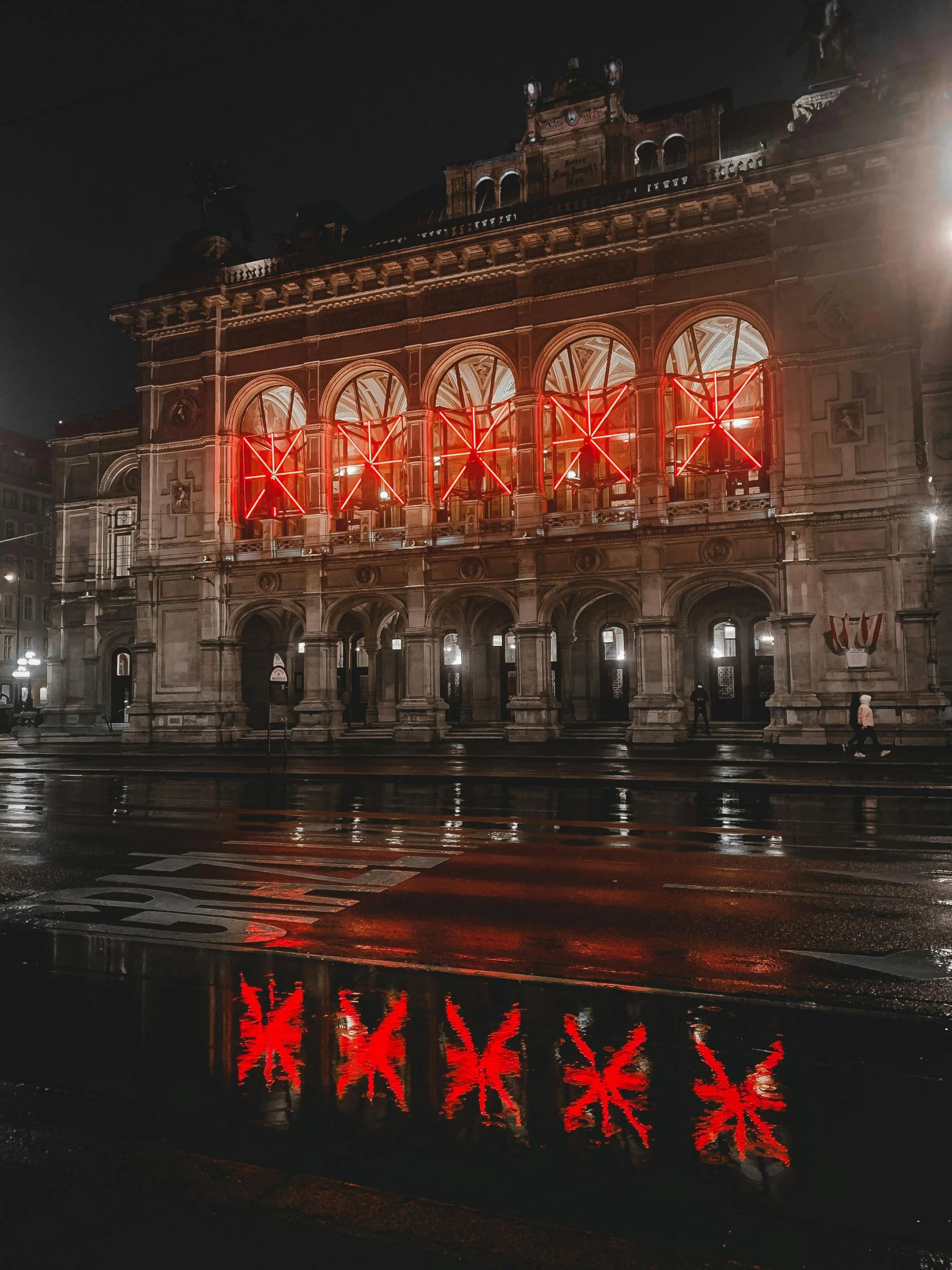 a building with many red lights on it