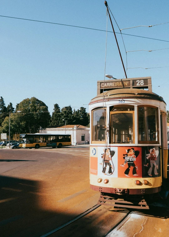 an electric trolley in the middle of a city