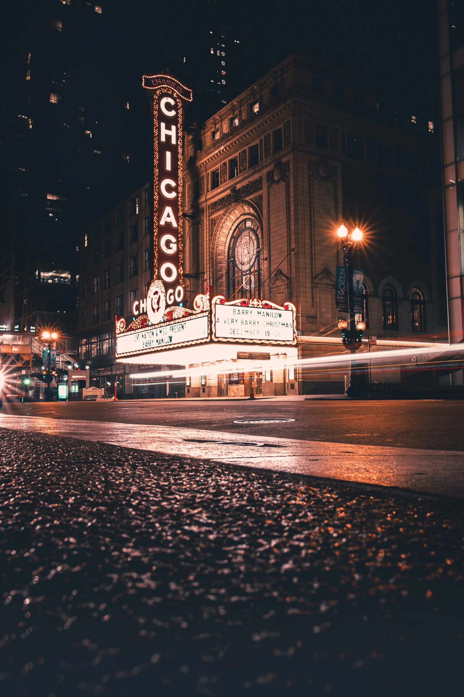 the chicago sign in a city at night