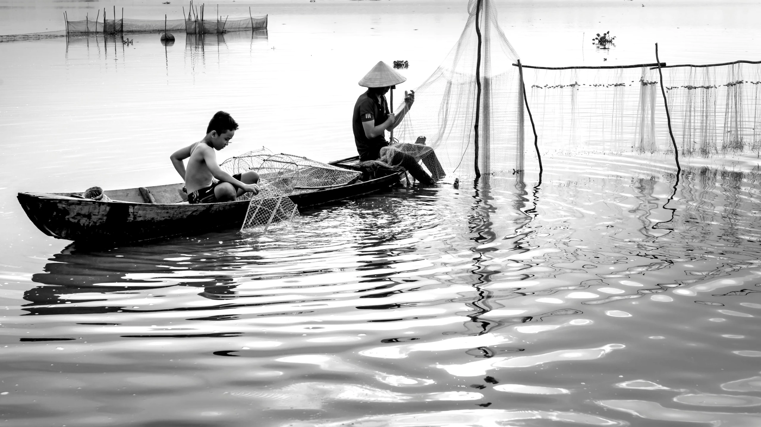 there is a man and woman in the boat