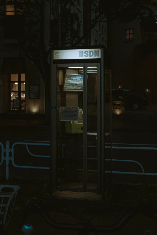 a dark and empty bus stop at night