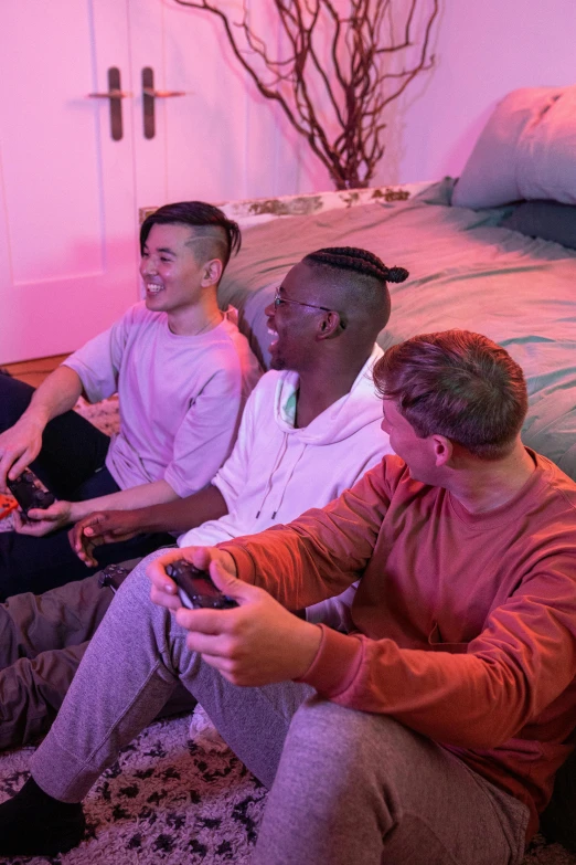 men watching and playing the nintendo wii in their living room