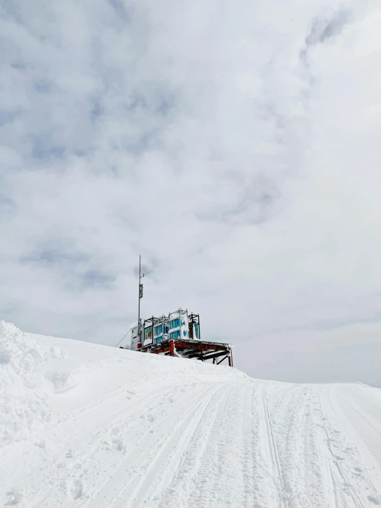 a skier is coming down the hill to head