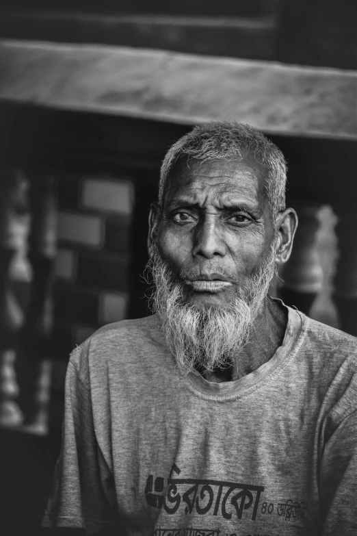 an old man with a grey beard and mustache