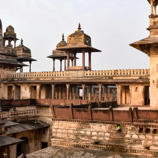 a group of large stone structures sitting inside of a building