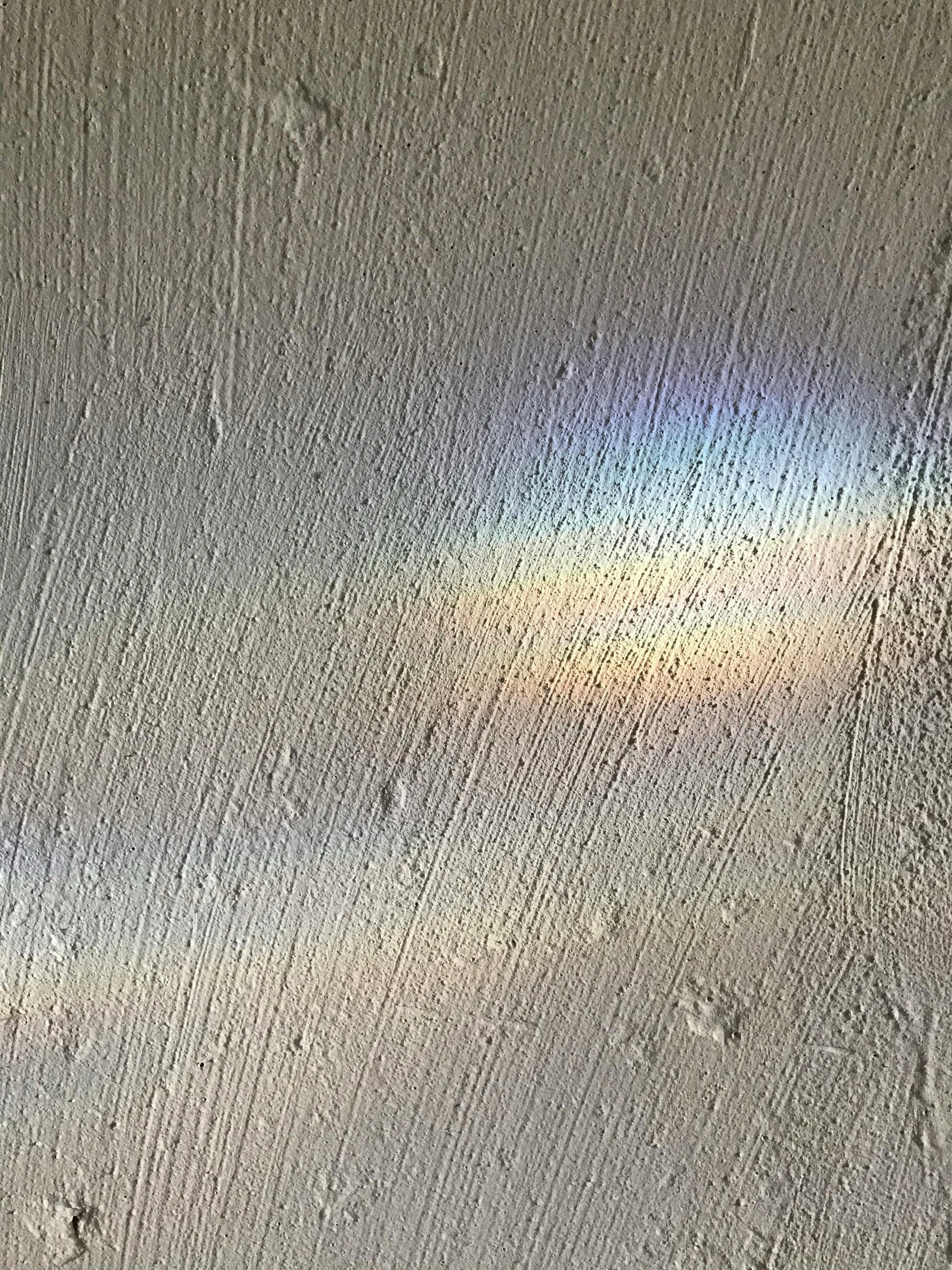 a piece of sand sitting on top of a white floor