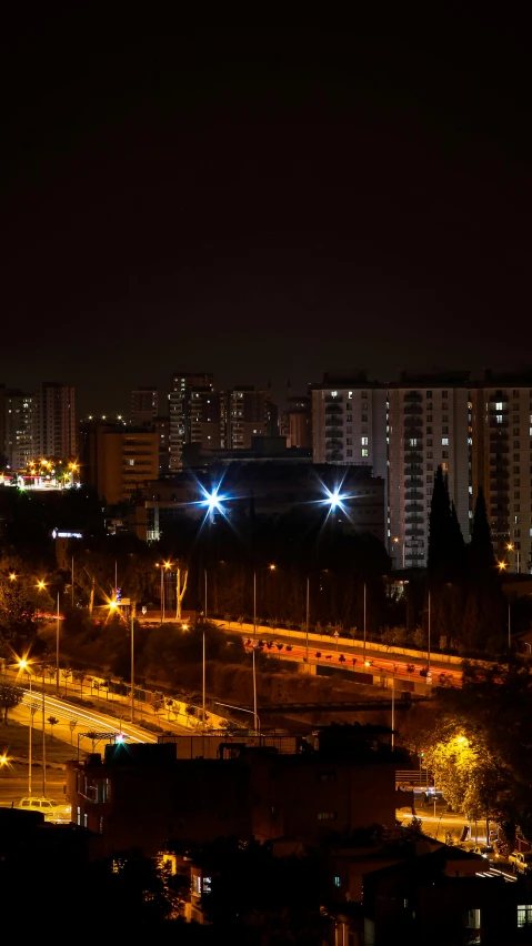 a large skyline with several different street lights