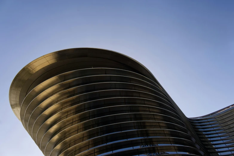 a large metal structure on the side of a building