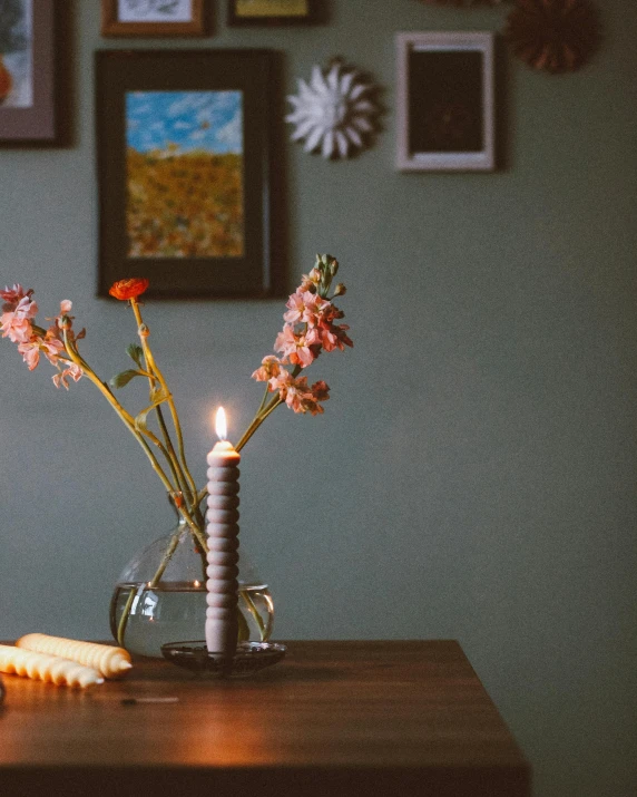 a bunch of flowers that are sitting in a vase