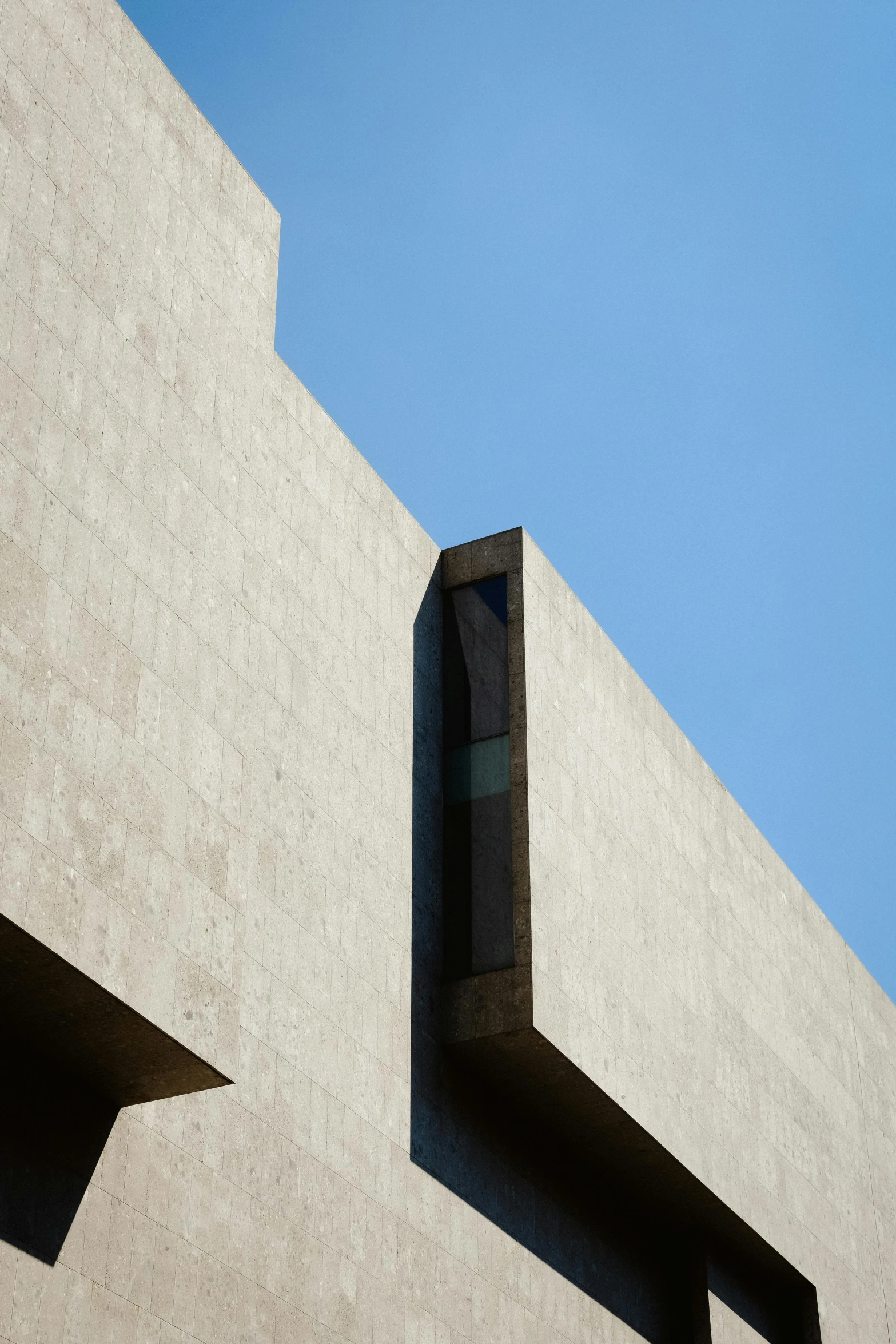 the top of the wall is missing in a square of concrete