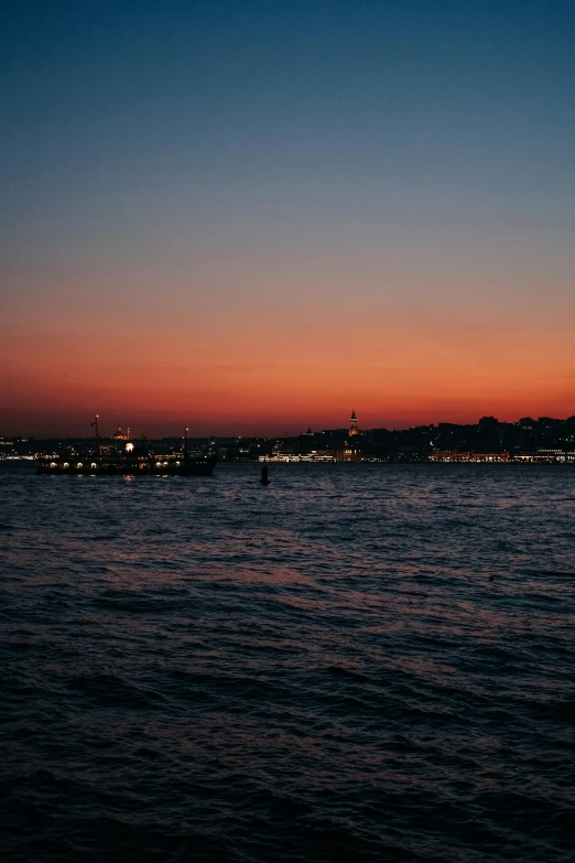 the view of a large body of water at night