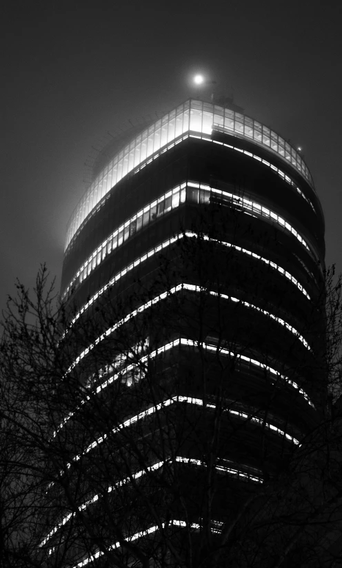 night time picture of a large building with windows