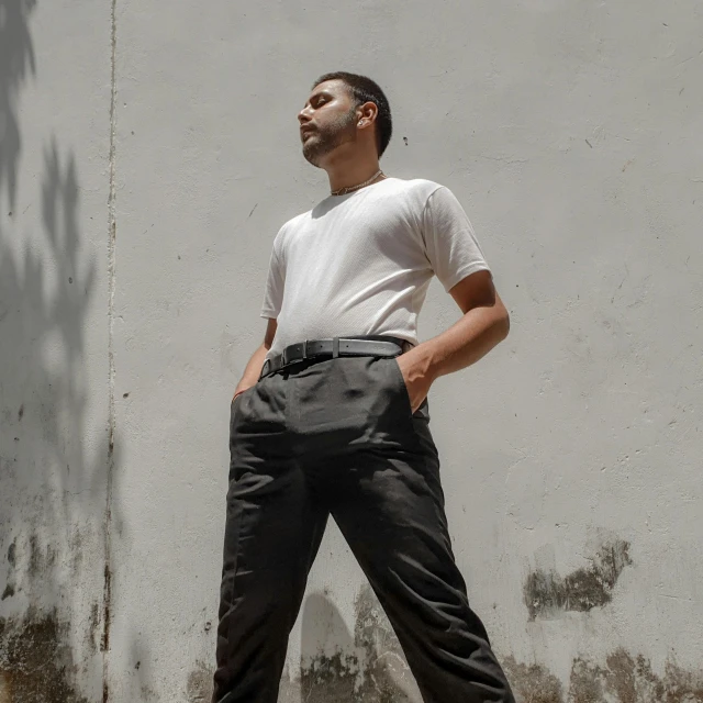 a man standing in front of a building