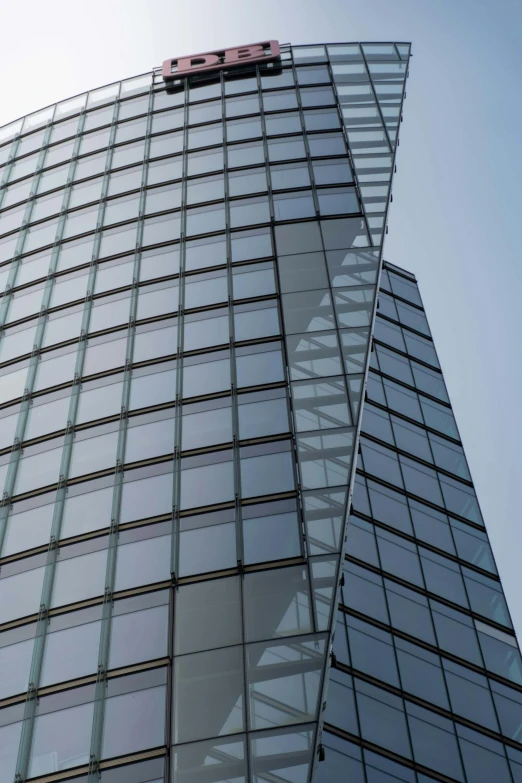 a large glass building with a red number 50 on it