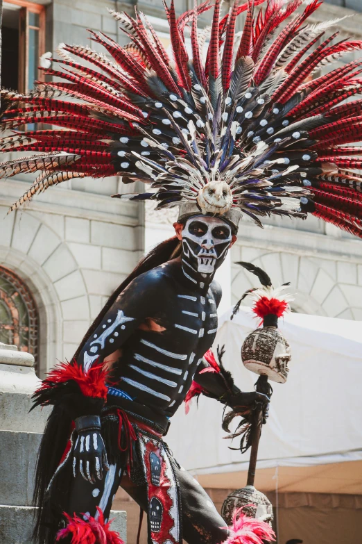 a man with a weird looking costume at a carnival