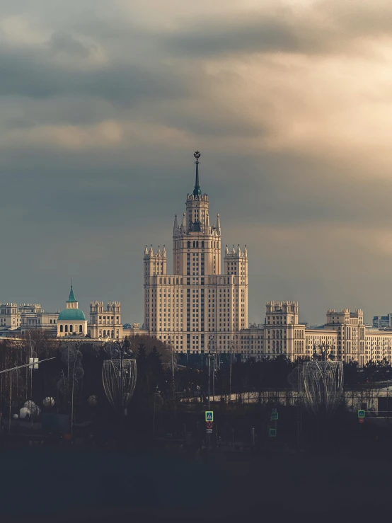 a city with tall buildings under gray skies