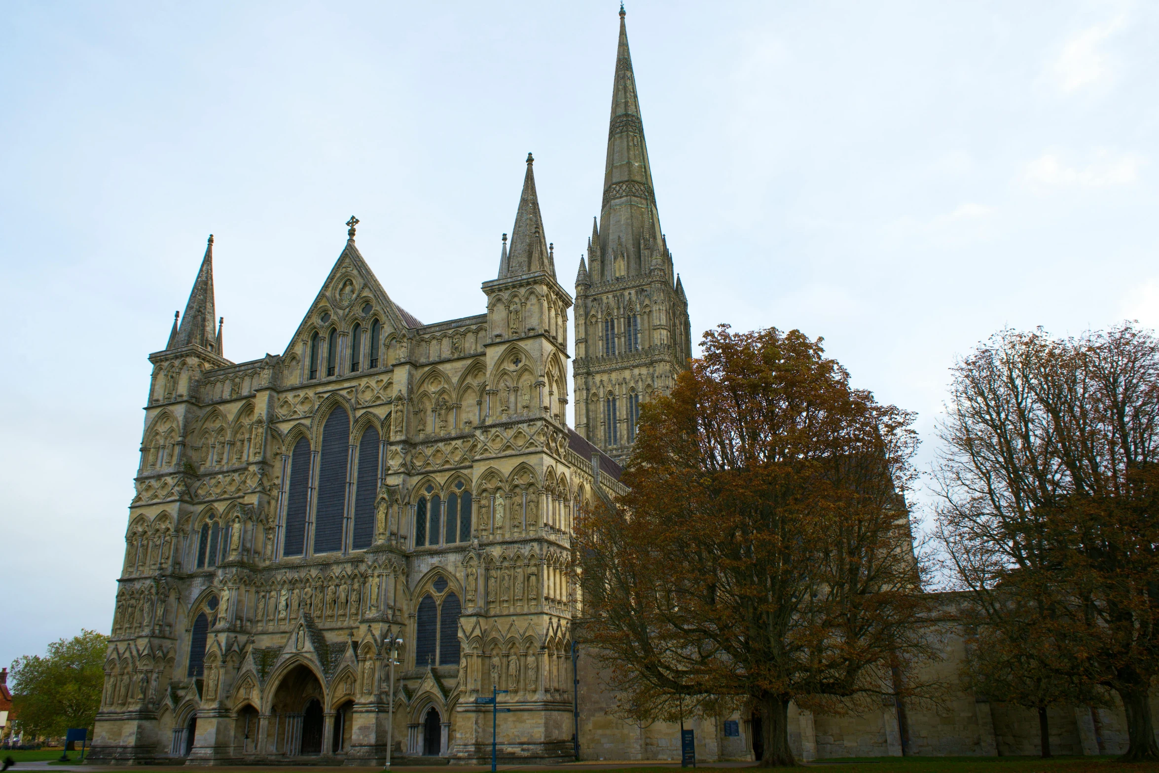 an old church with several tall towers and spires