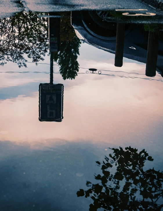 a reflection of the building in the water