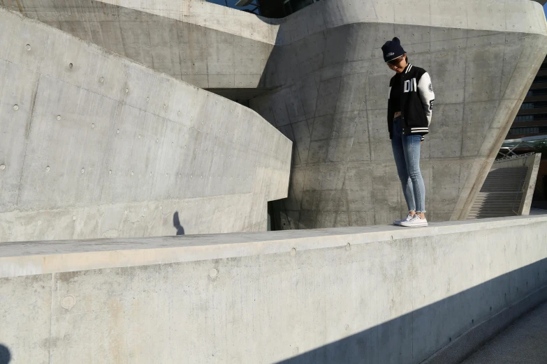 man on skateboard at the edge of concrete ramp